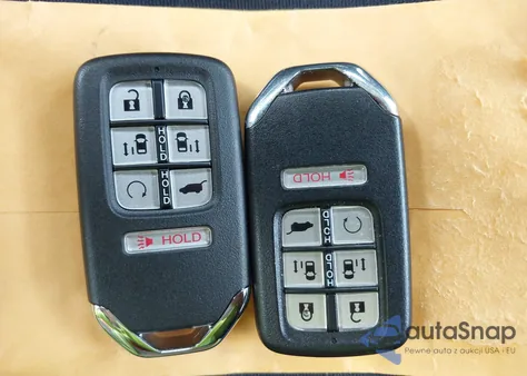 2023 Honda Odyssey Sport from USA, damaged, VIN 5FNRL6H77PB034404